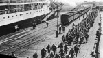 Victorian infantry embarking on HMAT Hororata (A20), at Station Pier, Port Melbourne, 1914. At left is HMAT Orvieto. Reprinted courtesy of the Australian War Memorial.